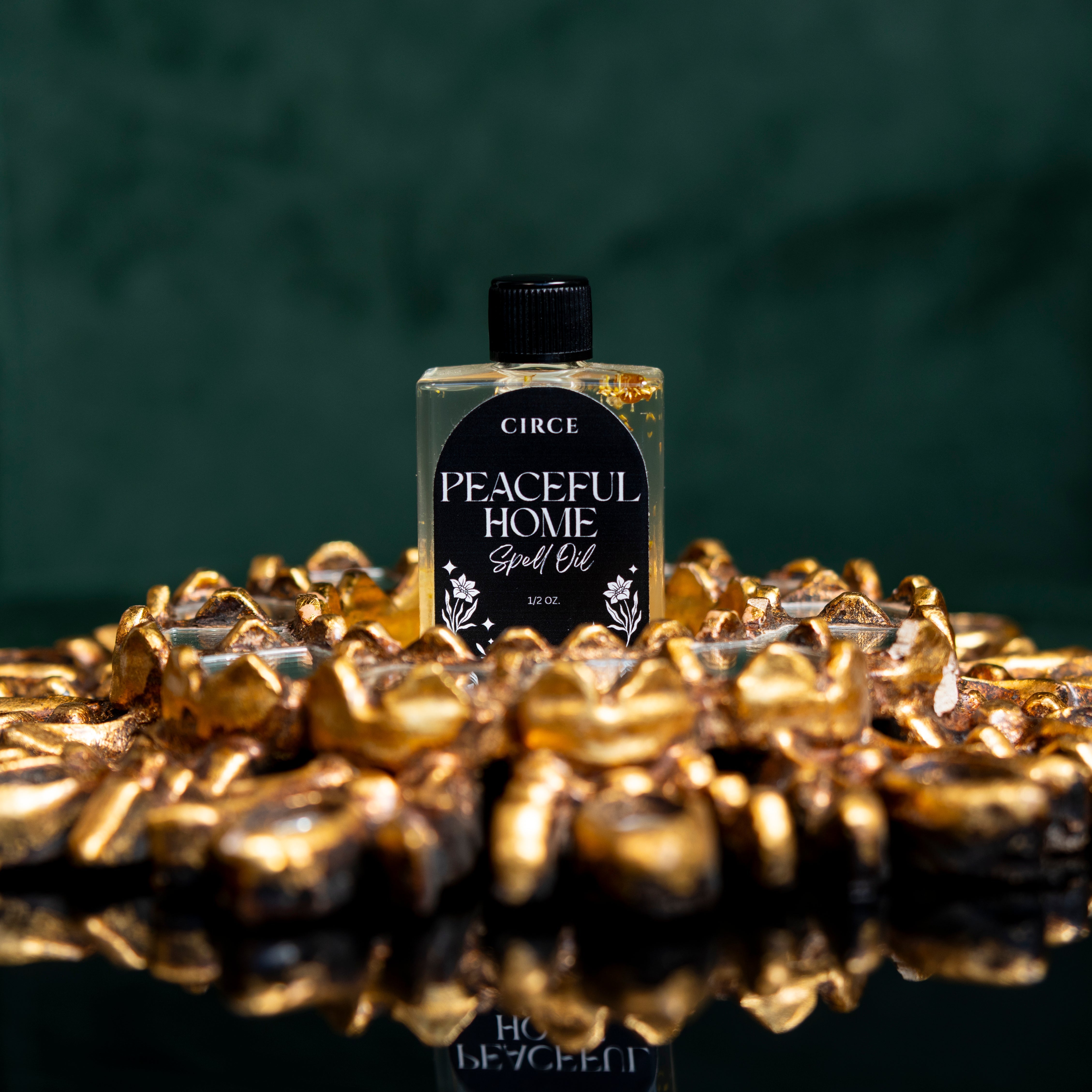 Bottle of Circe Boutique Peaceful Home Ritual Oil with calming herbs and essential oils for harmony and calm energy.