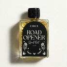 Bottle of Circe Boutique Road Opener Ritual Oil with herbal ingredients, designed to remove obstacles and open paths.