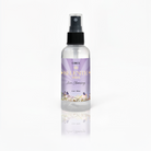 Selenite Aura Cleansing Mist spray bottle from Circe Boutique with white tea and ginger scent, used for energy clearing and aura cleansing.