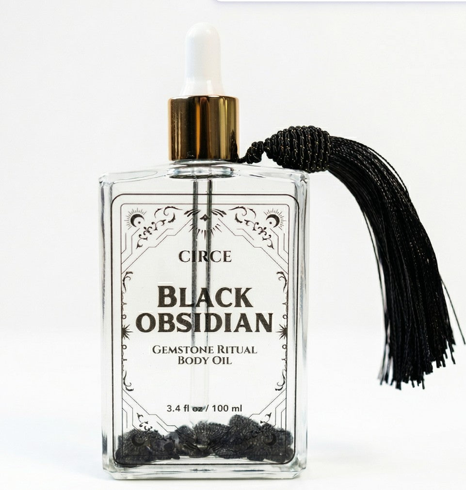 Protection Body Oil with obsidian crystal, Circe Boutique ritual oil in a sleek bottle, designed for spiritual protection and skin nourishment.
