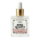 Rose quartz gemstone body oil by Circe Boutique in a 3.4 oz bottle, designed for self-love and glowing skin.