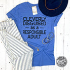 A black SS graphic tee by The Graphic Tee featuring humorous text that reads "Cleverly Disguised as a Responsible Adult."