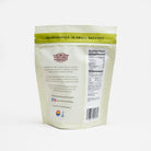 Colorado Popcorn Company dill pickle popcorn in a 2 oz bag, featuring green popcorn coated with dill pickle flavor.