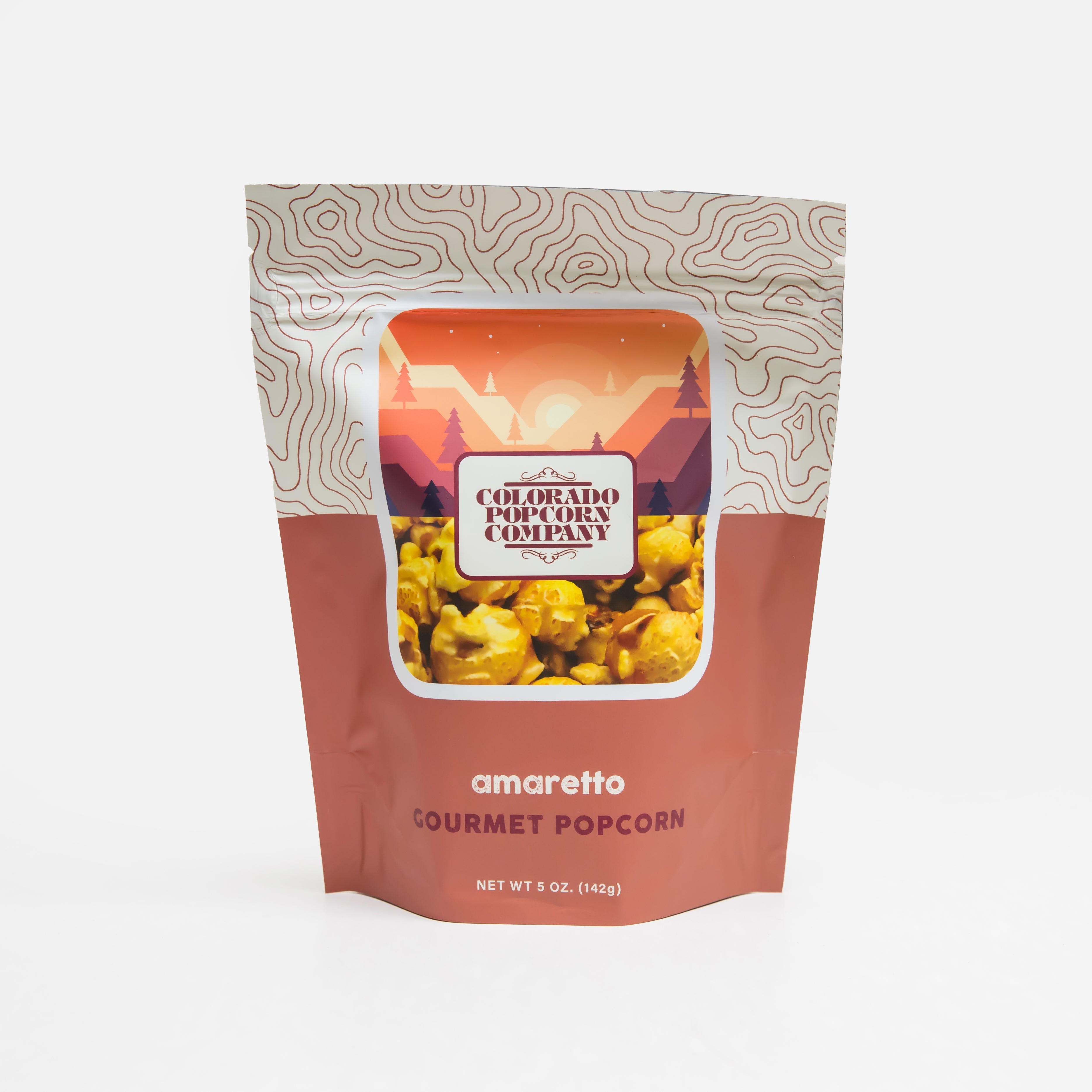 Amaretto flavored popcorn by Colorado Popcorn Company in a 5 oz bag, with caramel-colored popcorn visible in the image.