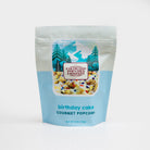 Colorado Popcorn Company birthday cake flavored popcorn in a 5 oz bag, with colorful sprinkles and festive cake-inspired decorations.