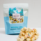 Colorado Popcorn Company birthday cake popcorn in a 5 oz bag with colorful cake-inspired sprinkles and sweet flavor.