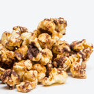Chocolate English Toffee popcorn from Colorado Popcorn Company in a 5 oz bag, featuring crunchy toffee and rich chocolate coating.