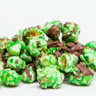 Chocolate mint popcorn by Colorado Popcorn Company in a 5 oz bag, showing glossy chocolate and green mint pieces.