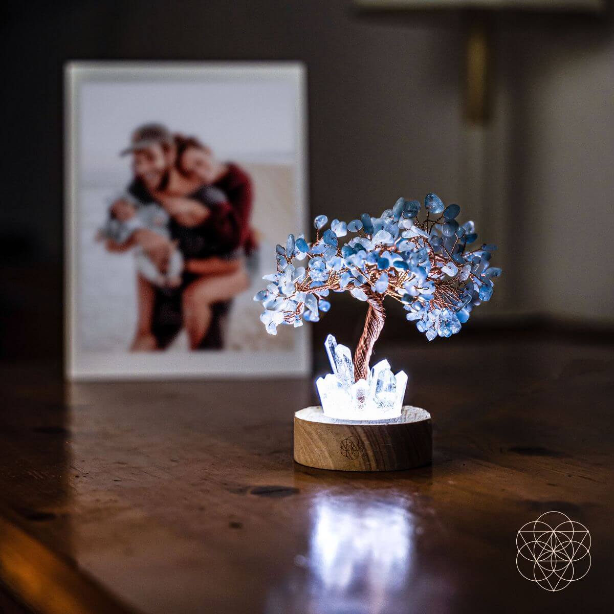 Night light featuring a guardian angel and aquamarine tree design, symbolizing protection and serenity by Conscious Items.