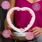 Rose quartz heart night light by Conscious Items, featuring a Love Magnet design, glowing softly as a calming bedside lamp.