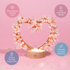 Rose and clear quartz tree lamp night light by Conscious Items, featuring a delicate branch design with glowing crystals.