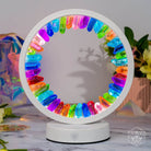Rainbow After the Storm Clear Quartz Night Light by Conscious Items, a soothing lamp of hope with vibrant rainbow colors and clear quartz.
