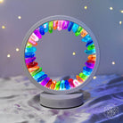Rainbow After the Storm Clear Quartz Night Light by Conscious Items, featuring a vibrant rainbow design and calming glow.