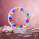 Rainbow After the Storm Clear Quartz Night Light by Conscious Items, featuring a colorful rainbow design and soothing glow.