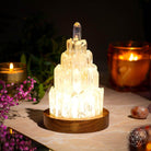 Clear Quartz Manifestation Tower Lamp night light by Conscious Items, featuring a sleek clear quartz design and ambient illumination.