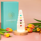 Conscious Items Stress Shield Night Light with 7 healing stones, glowing softly on a bedside table, promoting calm and relaxation.