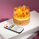 Conscious Items Midas Citrine Night Light titled "Turn My Life to Gold" with warm amber glow and decorative design.