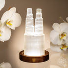 Two-Tower Selenite Lamp night light by Conscious Items, with deep energy cleansing and reset features, featuring natural selenite crystals.