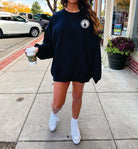 Black crewneck sweatshirt featuring a bold "I Have Really Cool Tattoos, But I'm Cold" graphic design, from Shop Karma Tees.