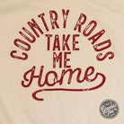 Unisex graphic T-shirt featuring "Country Roads Take Me Home" design, casual style, by The Graphic Tee.