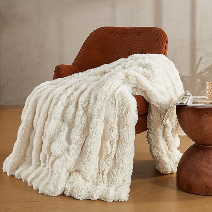 White Faux Fur Throw Blanket by CozyNest Decor, plush and cozy bed blanket, thick and warm for queen-sized beds.