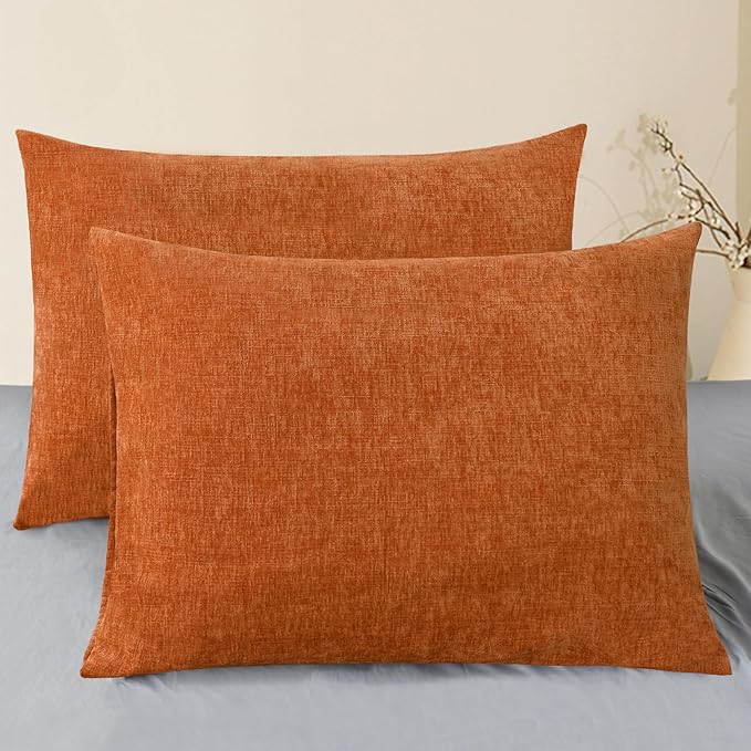 Set of two CozyNest Decor fall orange chenille throw pillow covers, 20x26 inches, for sofa, couch, or bed decor.