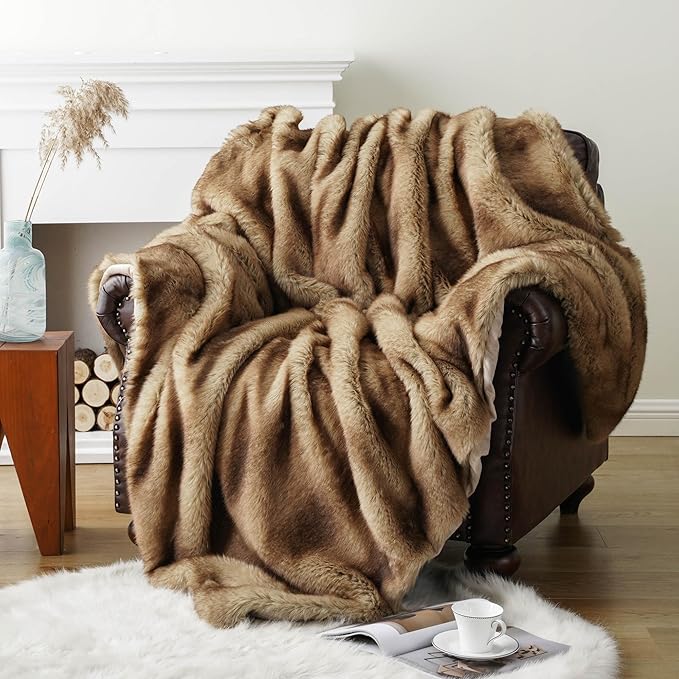 CozyNest Decor luxury ochre faux fur throw blanket with soft mink fur texture on a sofa for warm, plush home decor.