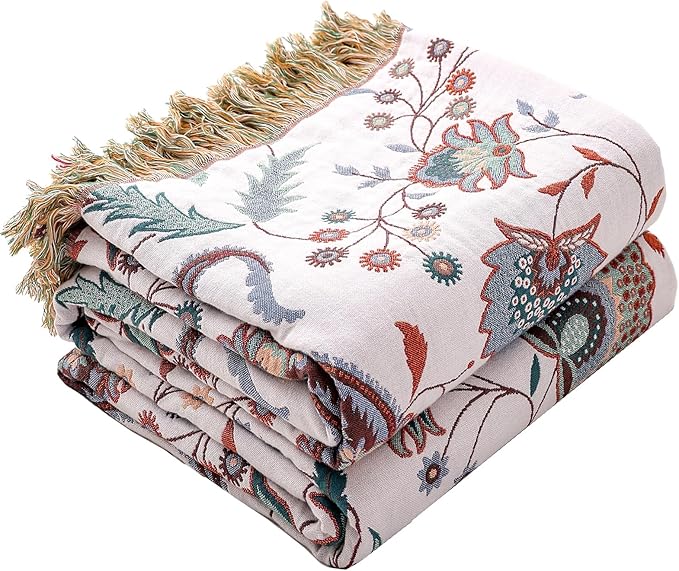 CozyNest Decor boho large cotton throw blanket with tassels, ultra-soft rustic quilt for sofa, bed, or travel decor.