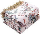 CozyNest Decor boho large cotton throw blanket with tassels, ultra-soft rustic quilt for sofa, bed, or travel decor.