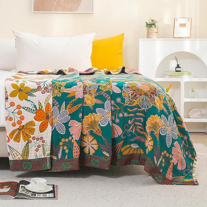 Boho rustic cotton throw blanket with floral design from CozyNest Decor, reversible, 60x80 inches, perfect for sofa or bed decor.