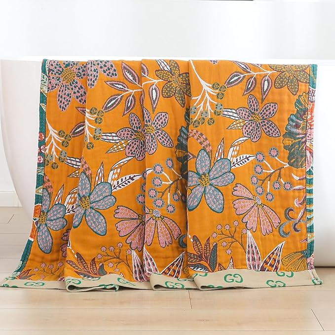 CozyNest Decor boho reversible cotton throw blanket with vintage floral design in yellow and green, perfect for bed or sofa.
