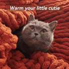 CozyNest Decor chunky knit throw blanket in orange, handmade with chenille yarn, thick, cozy, and machine washable for home decor.