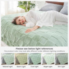 CozyNest Decor white checkered faux rabbit fur throw blanket with fuzzy texture, cream color, queen size on a couch or bed.