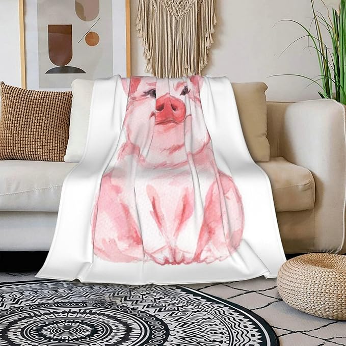CozyNest Decor pink watercolor pig throw blanket featuring a soft, whimsical pig design on a 50x60 inch plush blanket.