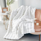 CozyNest Decor ivory faux fur throw blanket with plush double-sided rabbit fur, perfect for couch, sofa, chair, or bed.