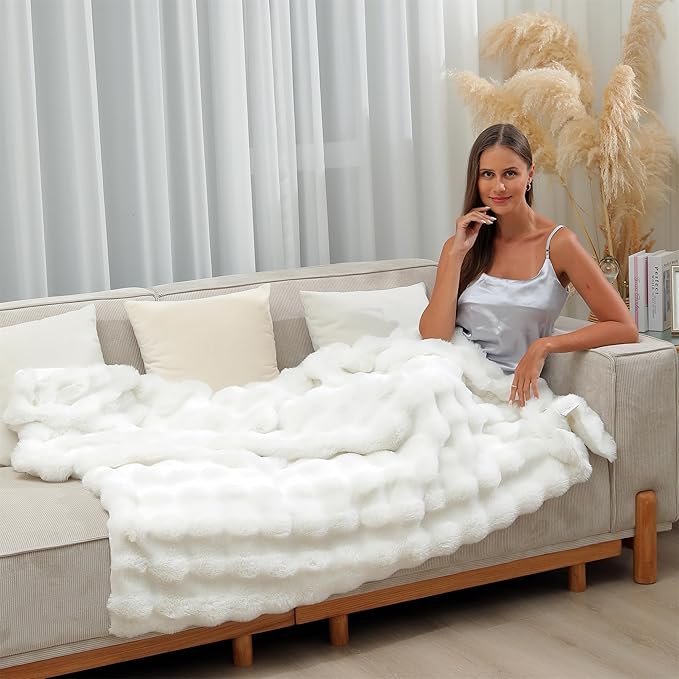CozyNest Decor ivory faux fur throw blanket with plush, fluffy double-sided rabbit fur for couch, sofa, or bed warmth.