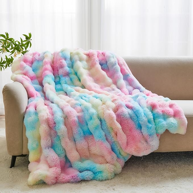 Colorful rainbow faux fur throw blanket from CozyNest Decor, plush and fluffy for sofa, bed, or chair decor.