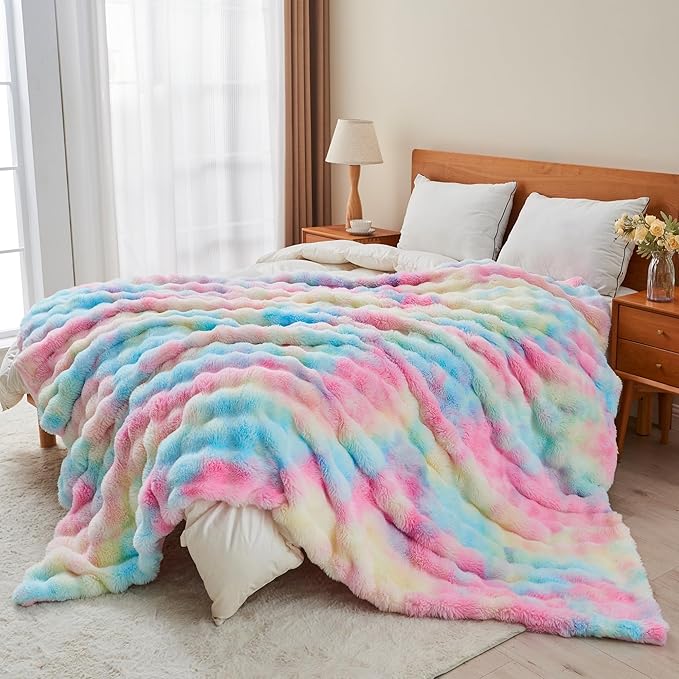 Colorful rainbow faux fur throw blanket by CozyNest Decor, plush and fluffy, perfect for sofa, bed, or chair decor.