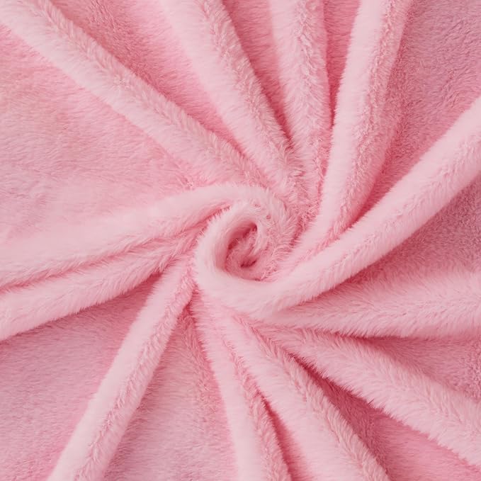 Colorful rainbow faux fur throw blanket by CozyNest Decor, plush fluffy faux rabbit fur for couch, sofa, or bed decor.
