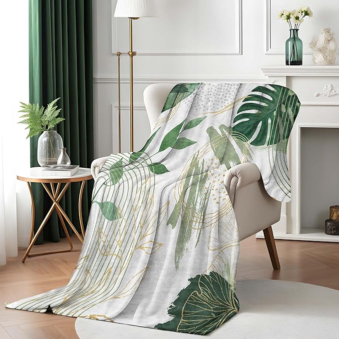 Sage green leaf pattern throw blanket by CozyNest Decor, soft and cozy flannel blanket for sofa or bed, 50x60 inches.