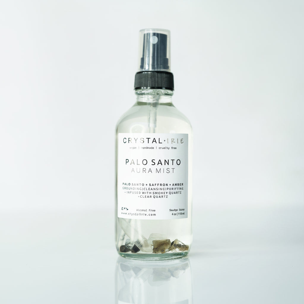 Crystal Irie Palo Santo Aura Spray bottle with a white label, designed for spiritual and aromatic use.