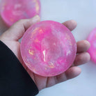 April Satellite crystal soap by Crystal Irie, showcasing a clear, beautifully shaped soap bar with intricate detailing.
