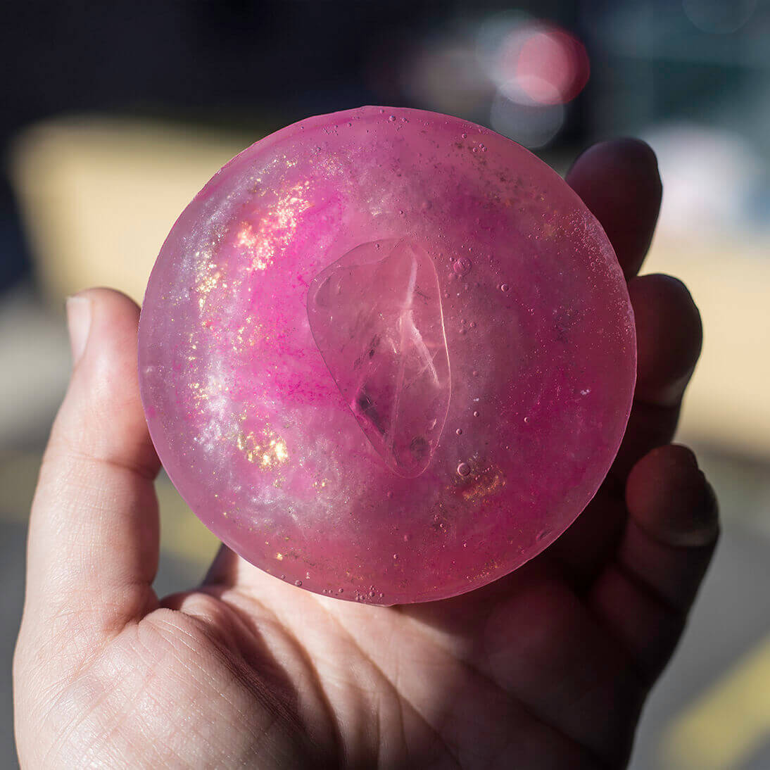 Crystal Irie April Satellite crystal soap bar with a clear, smooth appearance and intricate design on its surface.