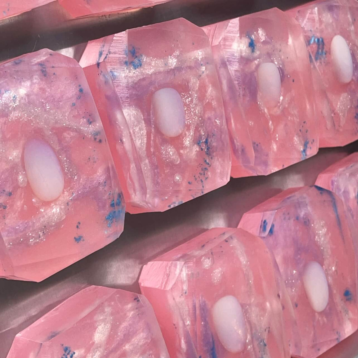 Crystal Irie Eternity of Enlightenment crystal soap with a clear, polished appearance and intricate design on the surface.
