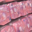 Crystal Irie Eternity of Enlightenment crystal soap with a clear, polished appearance and intricate design on the surface.