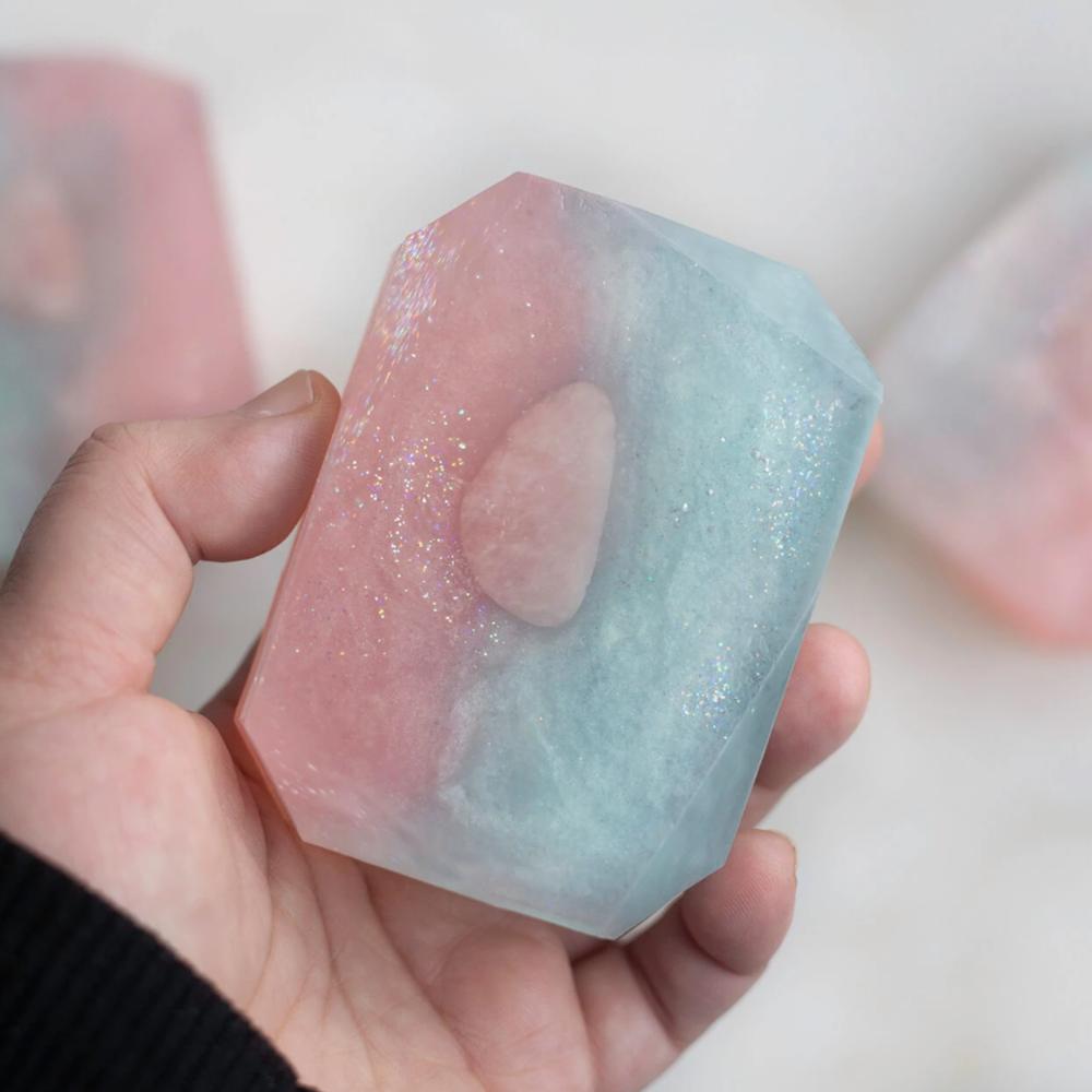 Crystal Irie Love Spelled crystal soap with intricate design and soft pastel colors, showcasing a luxurious skincare product.