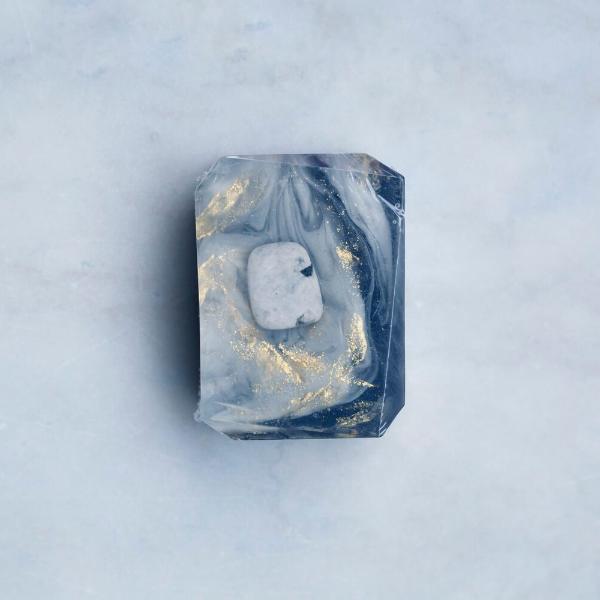 Crystal Irie Luna Moon crystal soap with a smooth, moon-shaped design, showcasing clear, shimmering crystal-like appearance.