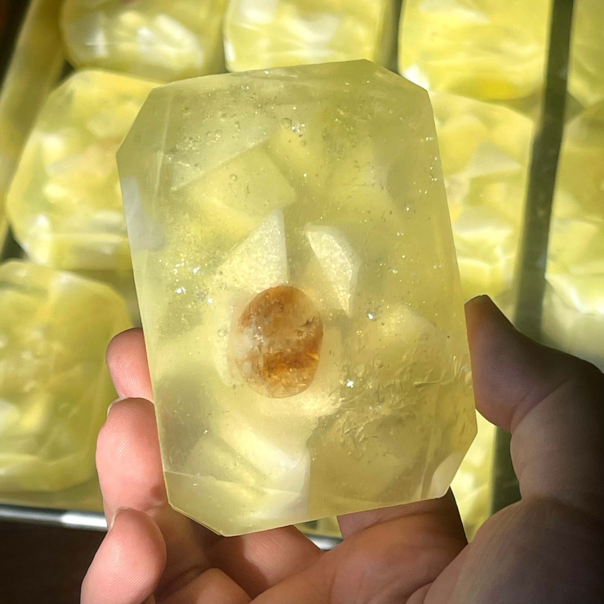 Crystal Irie Solar Healing crystal soap with embedded crystals, featuring a smooth, polished surface and natural gemstone details.