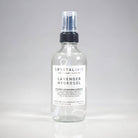 Lavender hydrosol bottle from Crystal Irie with a clear glass container and a white spray nozzle, displayed on a neutral background.