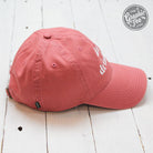 Nantucket Red relaxed twill dad hat by The Graphic Tee, featuring a casual cap style with adjustable strap and stitched branding.